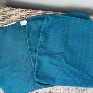 Three Sunbrella pillowcase covers. Size: 17 X 17